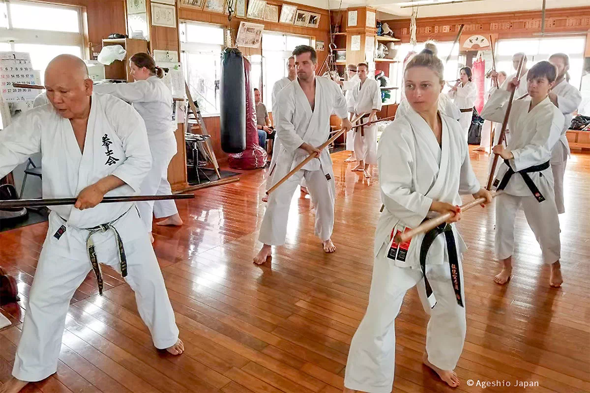 practicing karate with staves