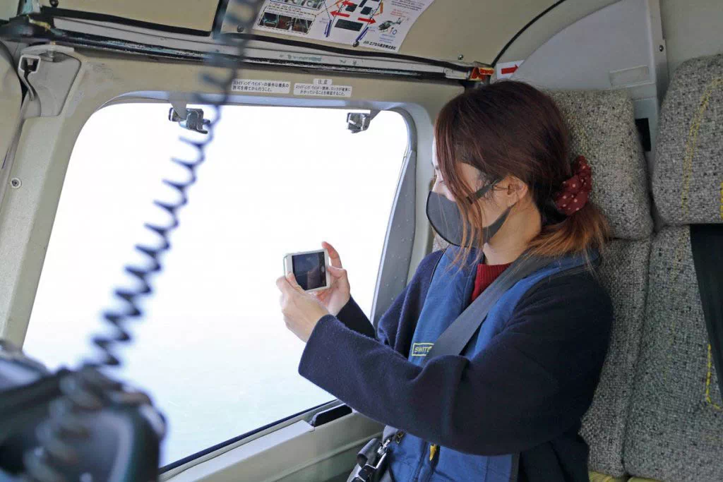 passenger taking a photo